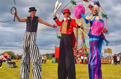 stilt walkers at company fun day'